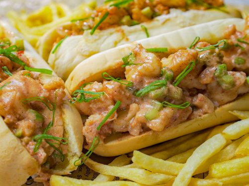 Lobster Roll Recipe, Hotdog buns filled with lobster and yogurt, topped with green onions and served with fries