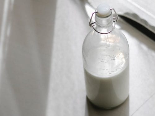 how to make 2-ingredient buttermilk, glass bottle containing buttermilk