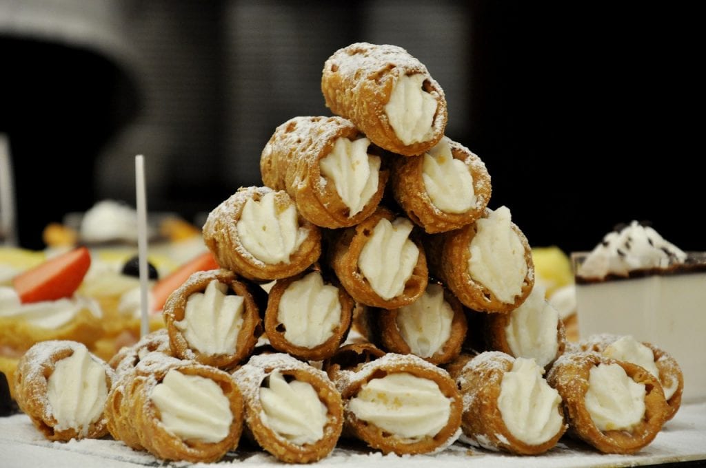 pieces of ricotta cannoli on a pyramid-style display