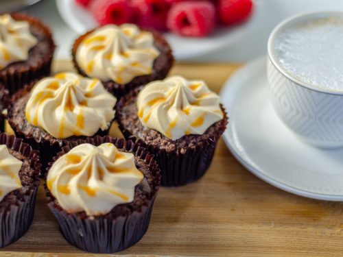 chocolate caramel coconut cupcakes with a cup of coffee