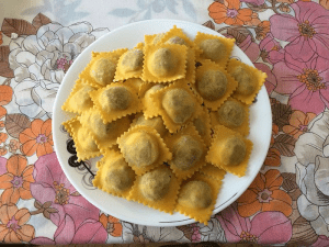 Plate of stuffed agnolotti pasta
