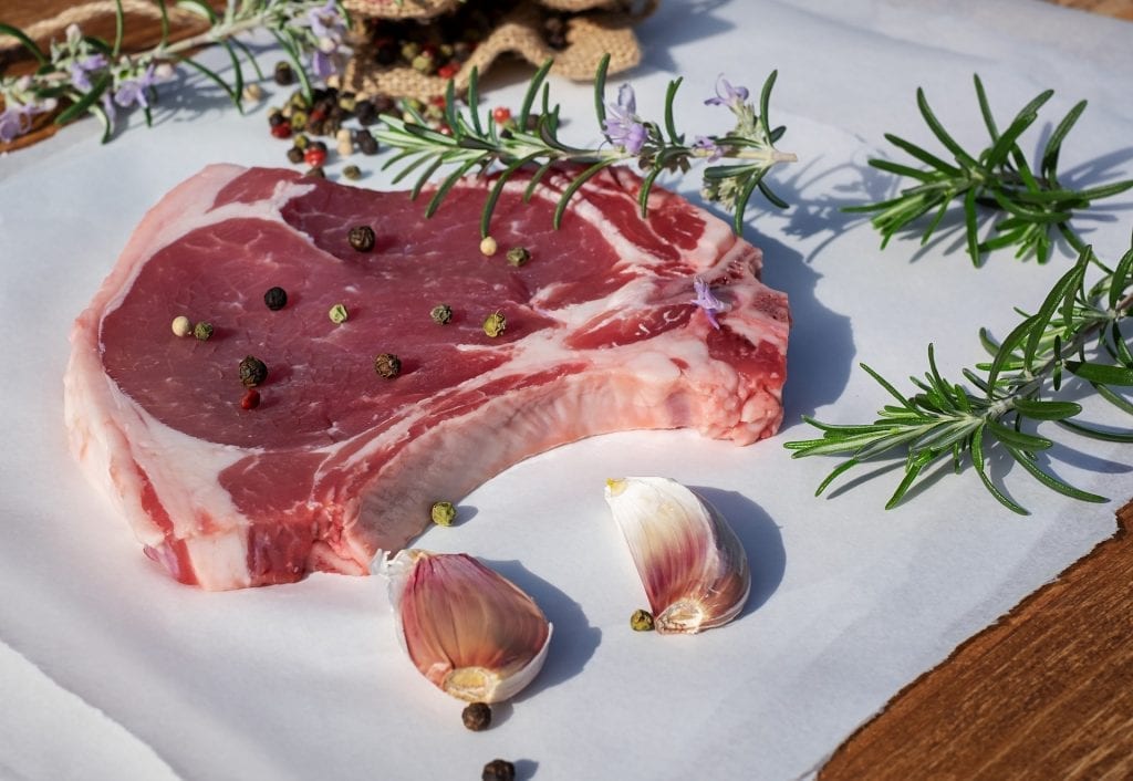 Cut of veal with garlic, peppercorns, and rosemary.