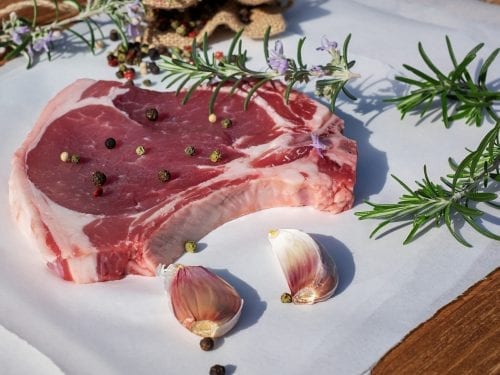 Cut of veal with garlic, peppercorns, and rosemary.