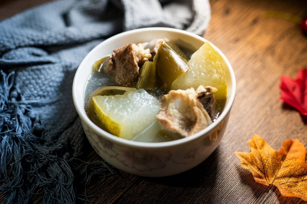 Winter Melon Soup- a small bowl of winter melon, meat, and vegetables in a light broth.