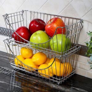 Various fruits in a pack of two stackable steel fruit baskets
