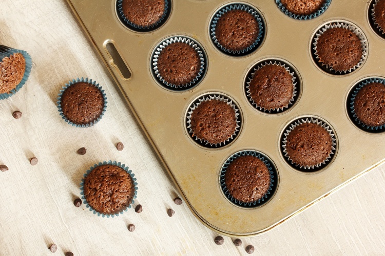 homemade brownie cupcakes in a muffin pan top down view