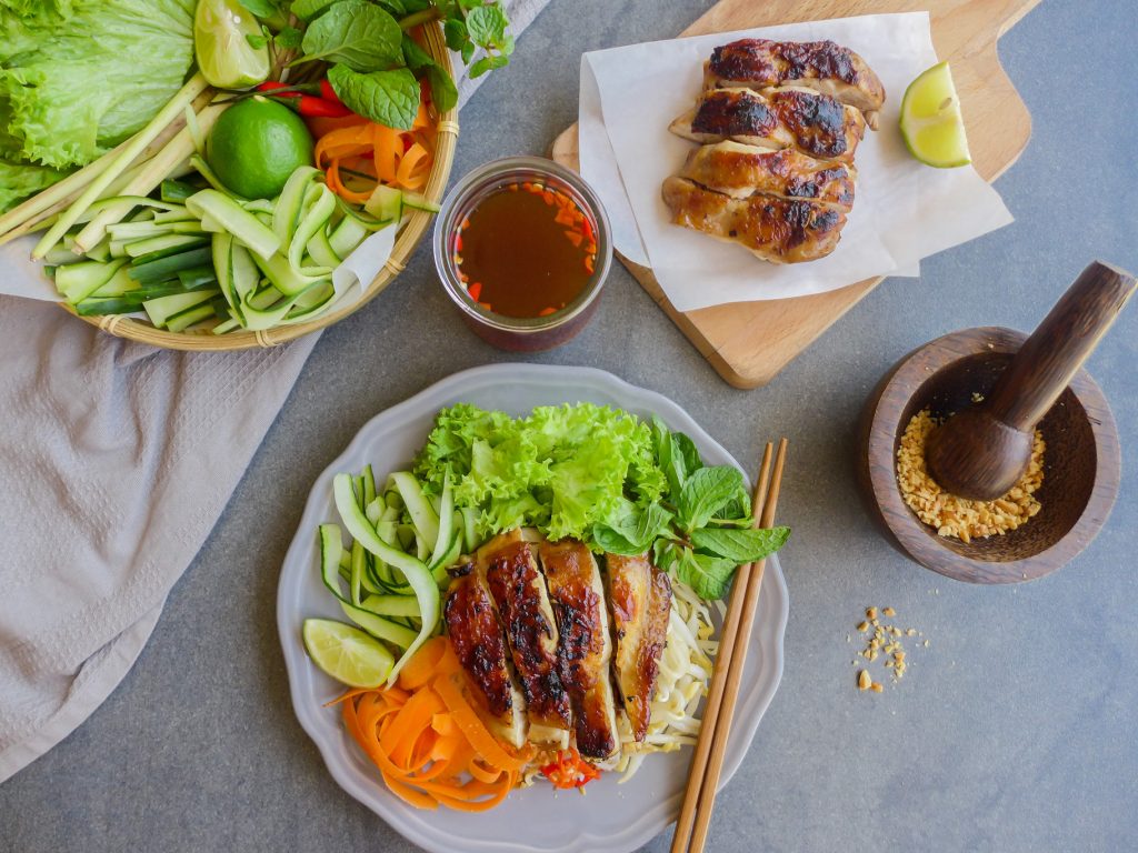 lemongrass chicken with veggies, nuoc cham, and smashed nuts