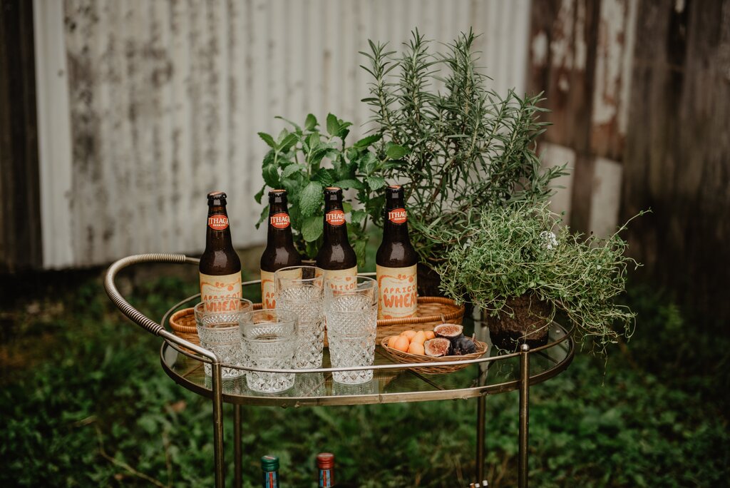 bottles of beer on a bar cart