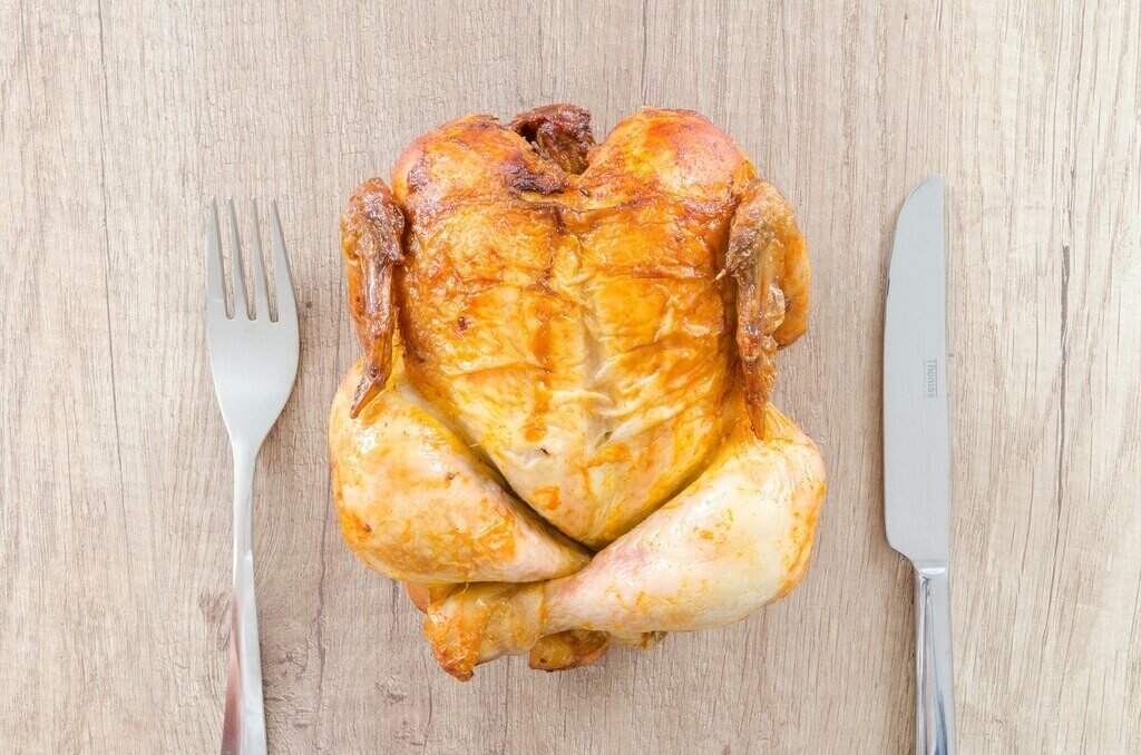 chicken rotisserie on a chopping board, How to Tell If Chicken is Bad