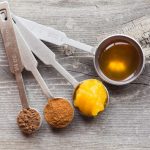 Metal measuring spoon with powdered and liquid ingredients, how many teaspoons in a tablespoon