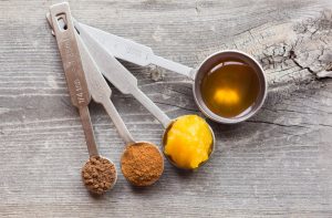 Metal measuring spoon with powdered and liquid ingredients, how many teaspoons in a tablespoon