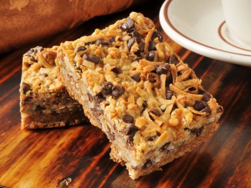 Hello Dolly Bars Recipe, dellicious dessert bars filled with chocolate chips, butterscotch chips, coconut, and walnuts, chunky magic cookie bars