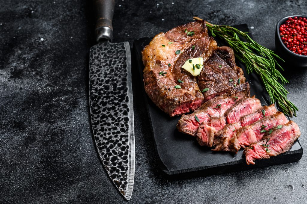 Sous Vide Chuck Roast Recipe, Chuck roast beef sliced and topped with butter and herbs