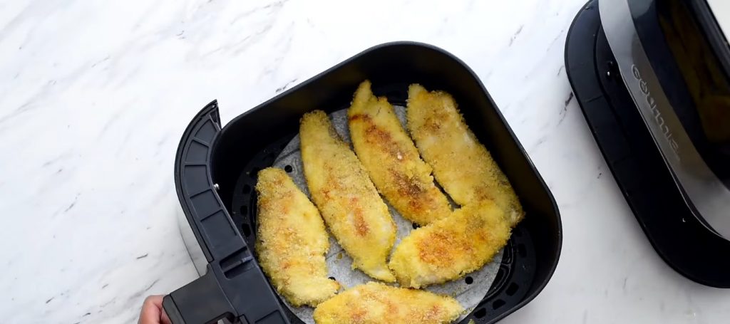 Frozen fish fillets in air outlet fryer