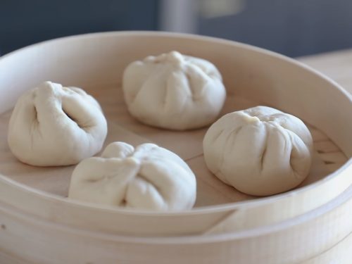 meat buns on a steamer