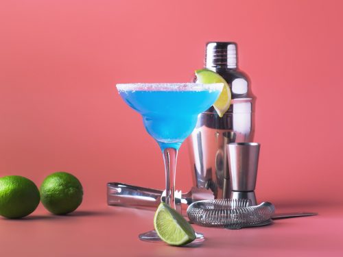 Blue margarita exotic alcoholic cocktail with tequila, liqueur,