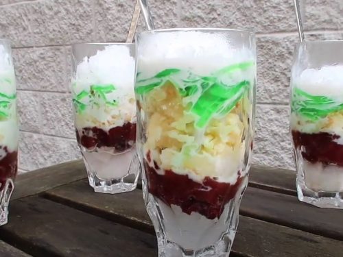 vietnamese three color dessert with a white background