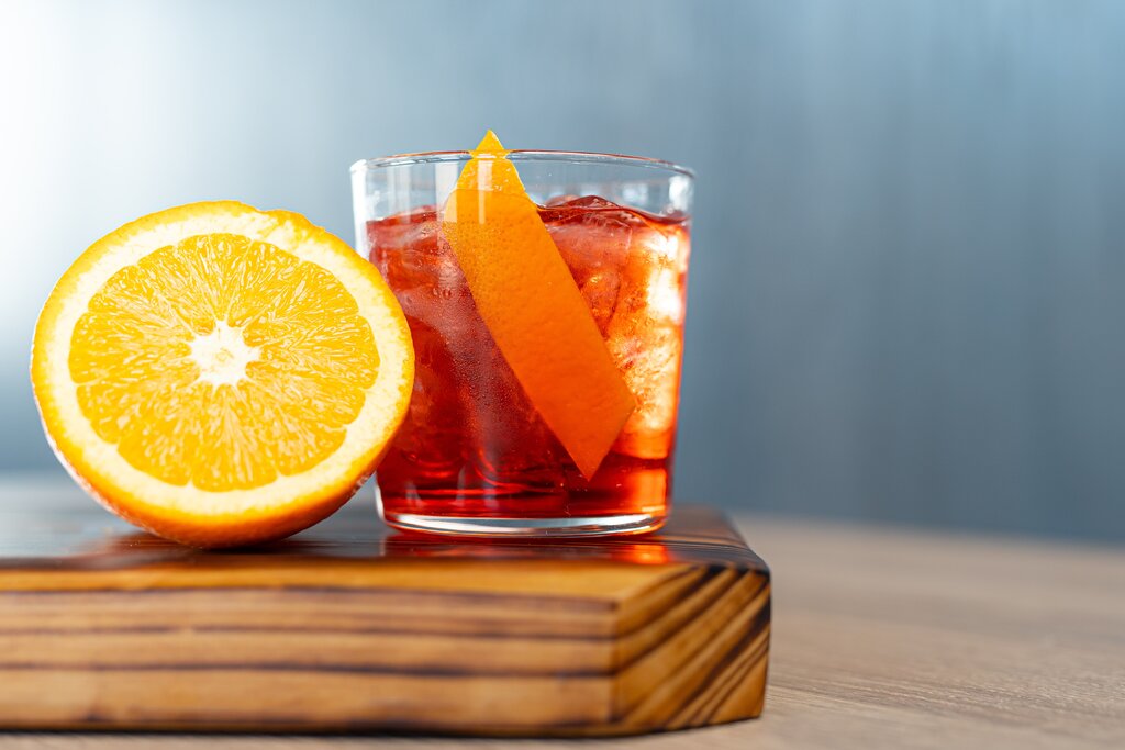 a glass of orange liqueur, cointreau vs grand marnier