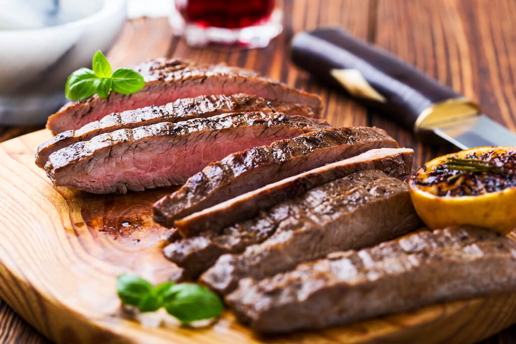 flank steak on a chopping board