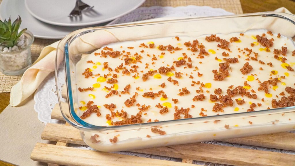 Maja Blanca (Coconut Pudding) Recipe, Coconut pudding with coconut crisps and corn in a casserole