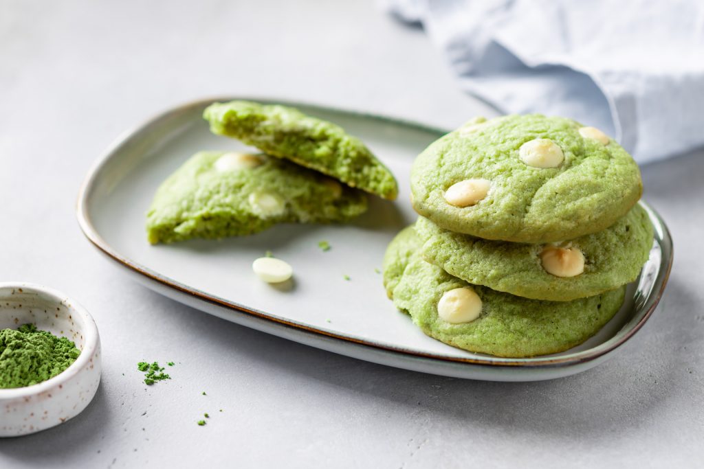 stack of green tea matcha cookies with white chocolate in plate