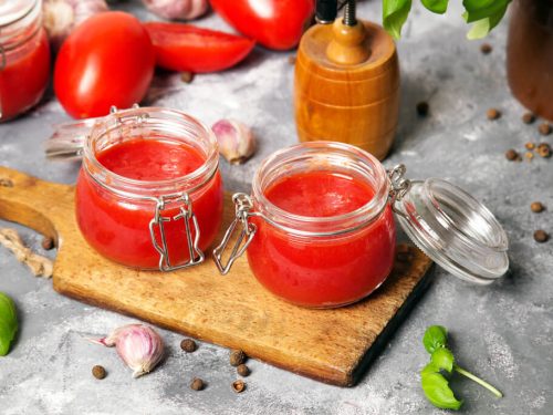 homemade tomato puree in airtight jars