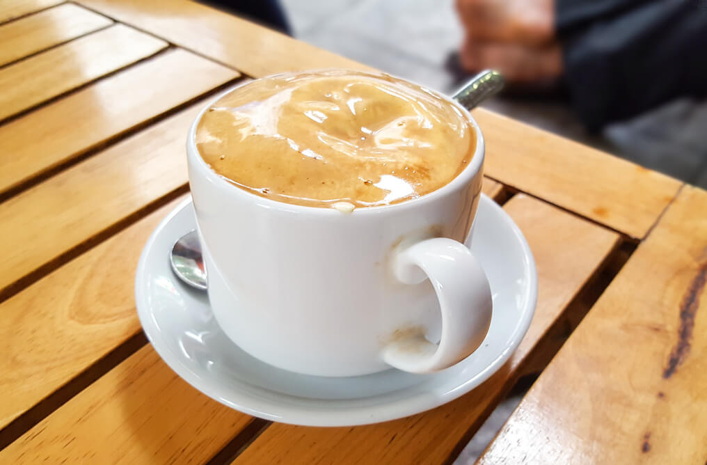 vietnamese egg coffee on a wooden table