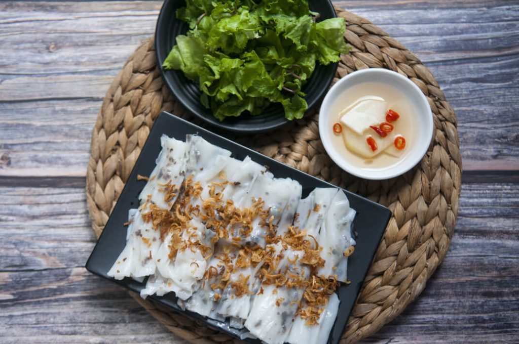 vietnamese pork rice rolls, lettuce, and nuoc cham