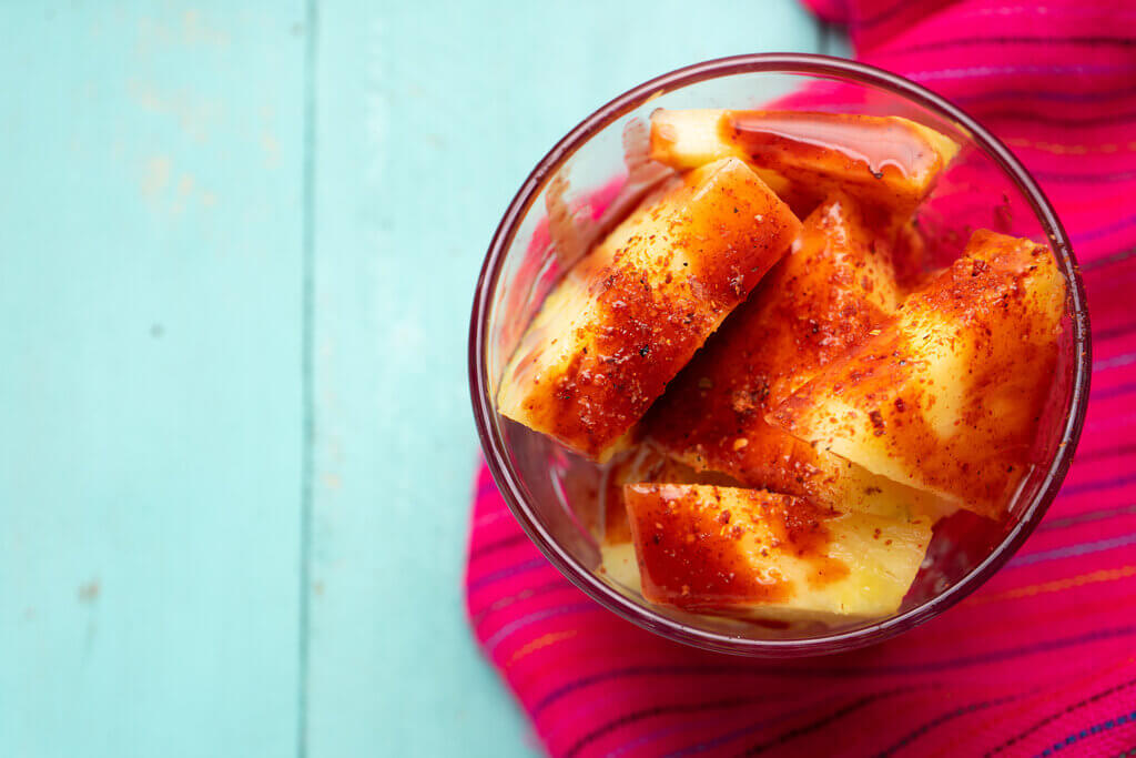 fruit bowl drizzed with chamoy