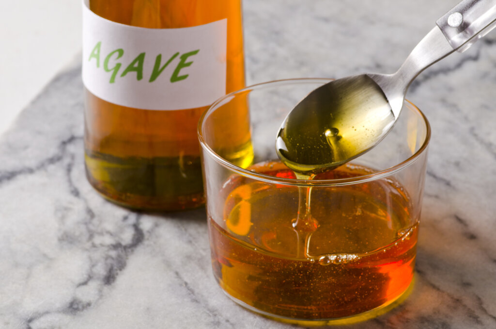 agave syrup pouring on a glass, honey substitute