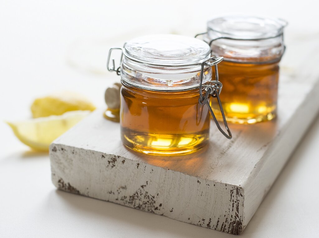 Two small bottles of brown rice syrup