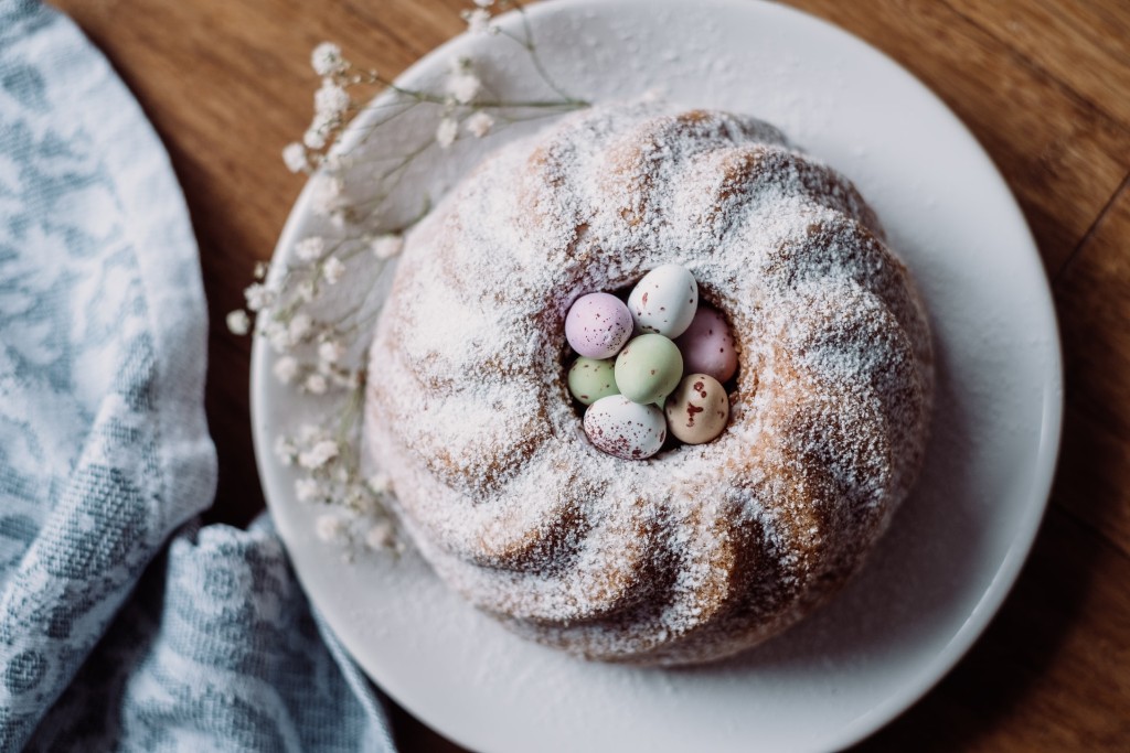 Bundt cake with powdered sugar dusting, one of the best Easter dinner ideas