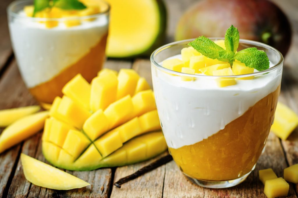 mango panna cotta with layers of mango and cream