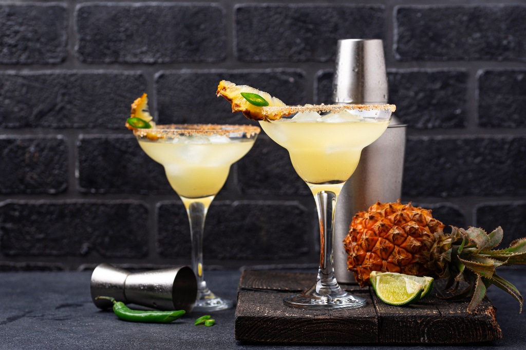Two glasses of mezcal cocktails