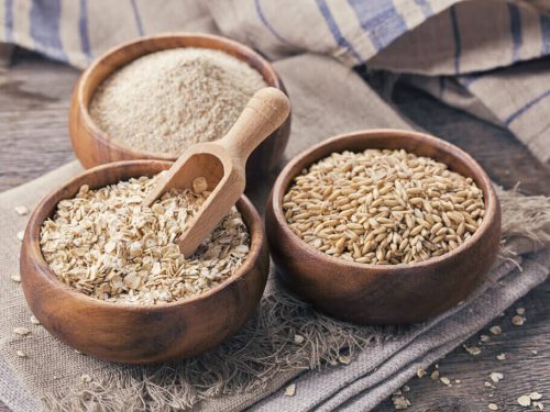 different types of oats in bowls