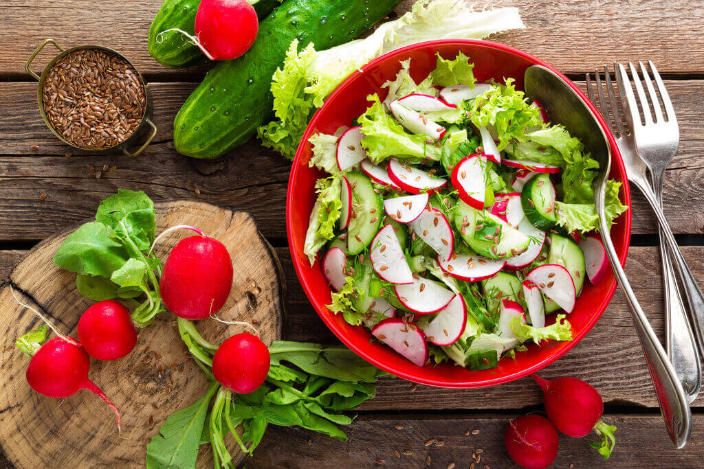 bowl of radish salad recipe on wooden table