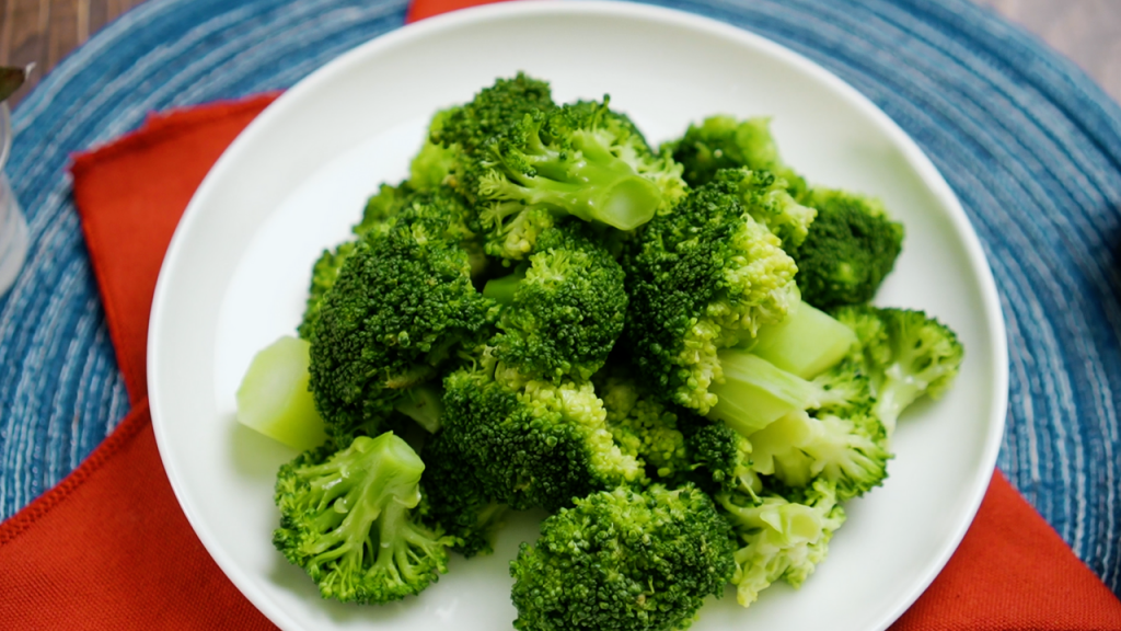 a plate of sliced broccoli, how to freeze broccoli