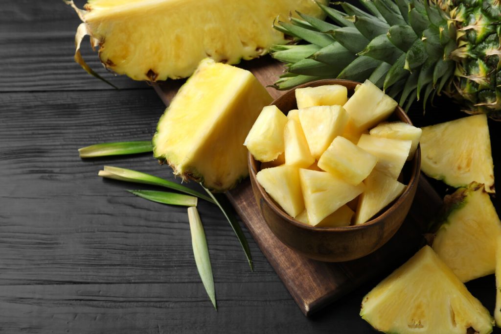 fresh pineapple on a table, how to cut a pineapple