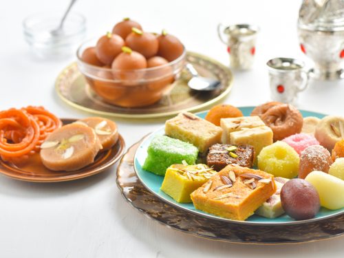 a spread of assorted sweet Indian desserts