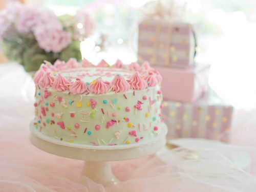 funfetti birthday cake on cake stand