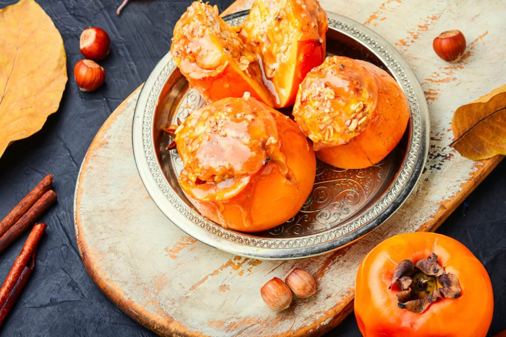 Caramelized Baked Persimmon, Baked persimmon served on silver metal plate