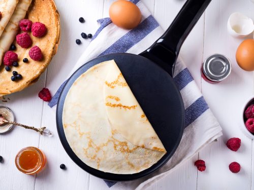 pancake maker surrounded by toppings and ingredients, best pancake maker
