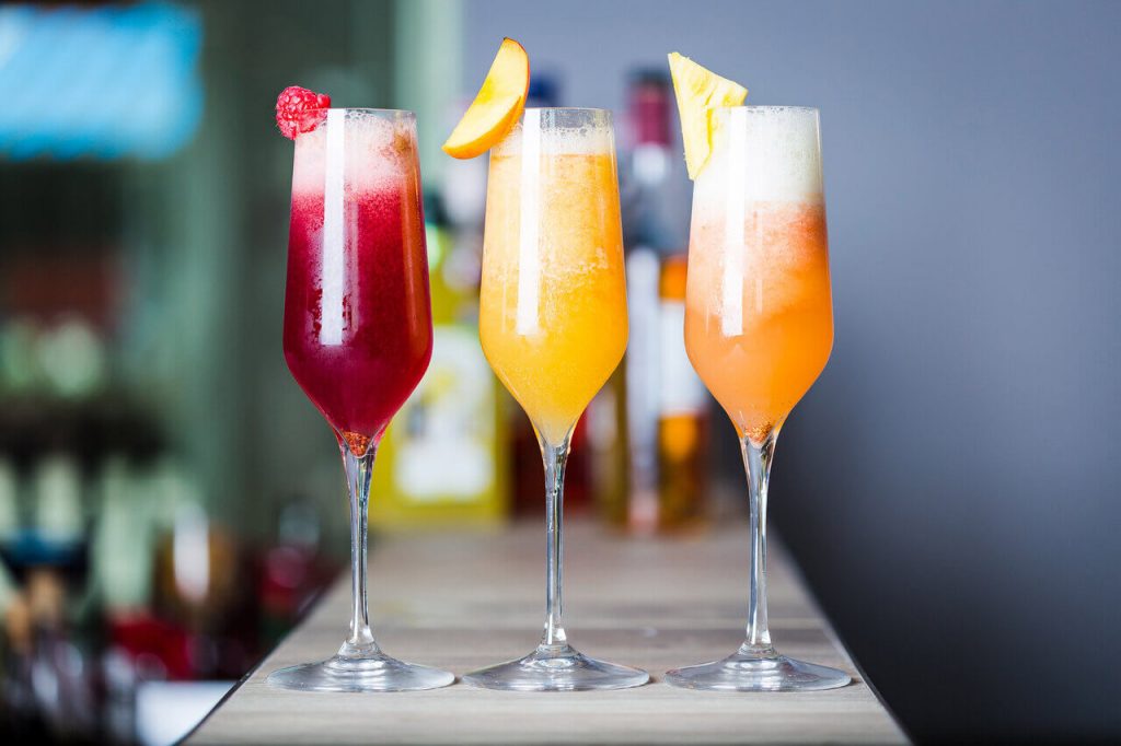 colorful summer cocktails with peach schnapps