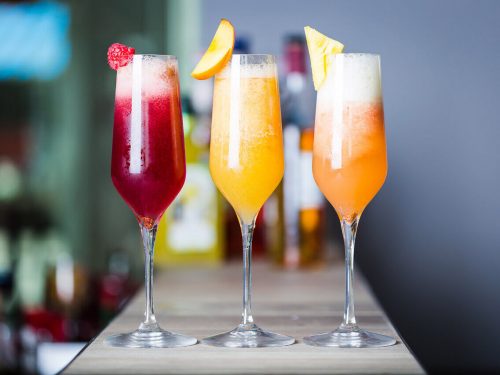 colorful summer cocktails with peach schnapps