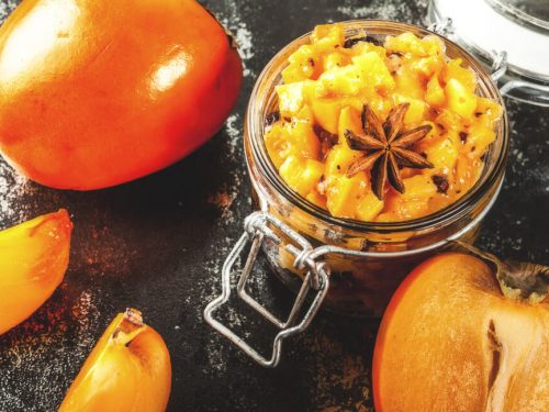 Persimmon Chutney Recipe, Persimmon chutney topped with star anise and served on mason jar