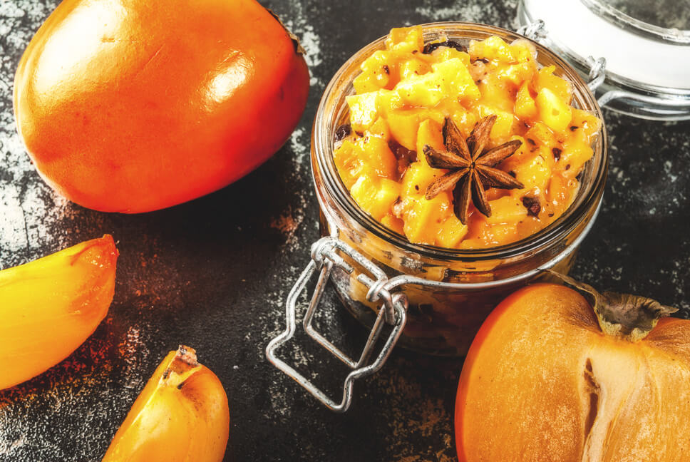 Persimmon Chutney Recipe, Persimmon chutney topped with star anise and served on mason jar