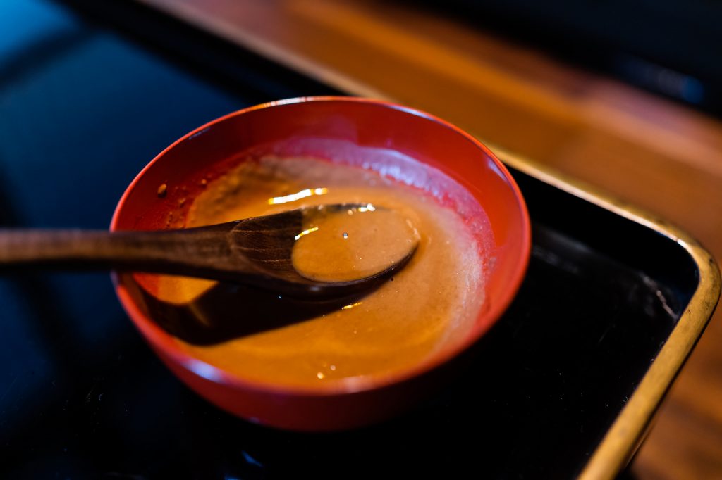 using a bowl of raisin miso sauce as hoisin sauce substitute