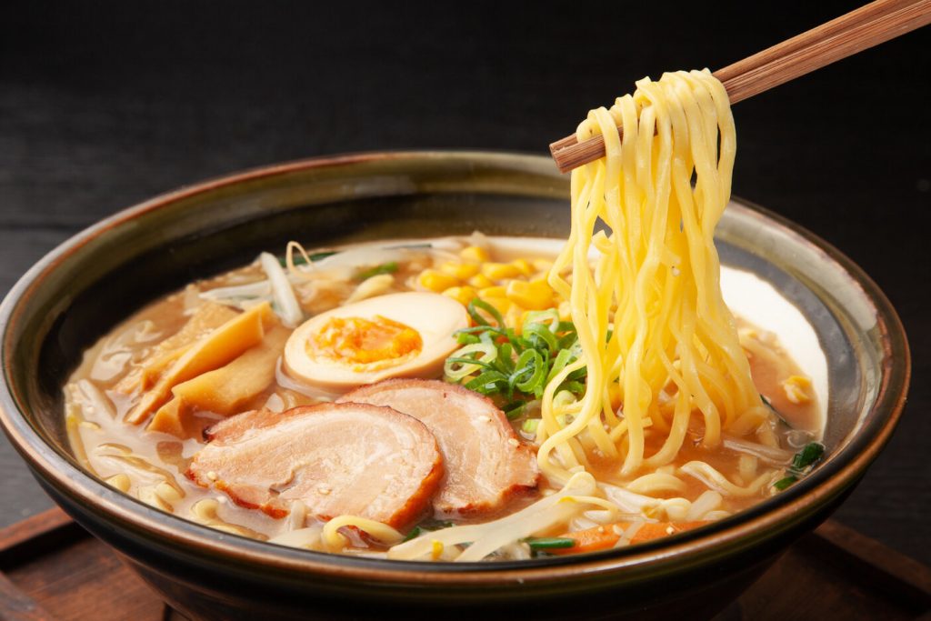 Miso Ramen Recipe, Miso ramen topped with sliced pork, eggs, and scallions in a bowl