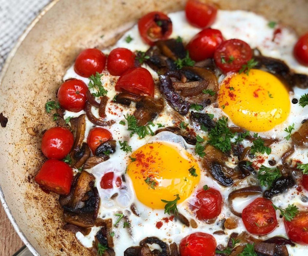 Mushroom Baked Eggs with Squished Tomatoes