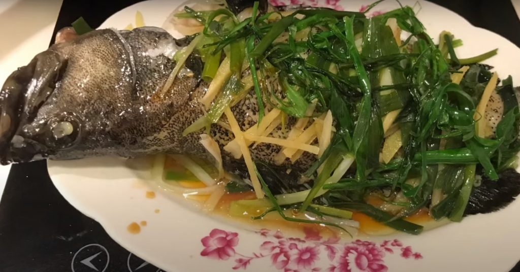 Steamed fish with ginger & spring onion